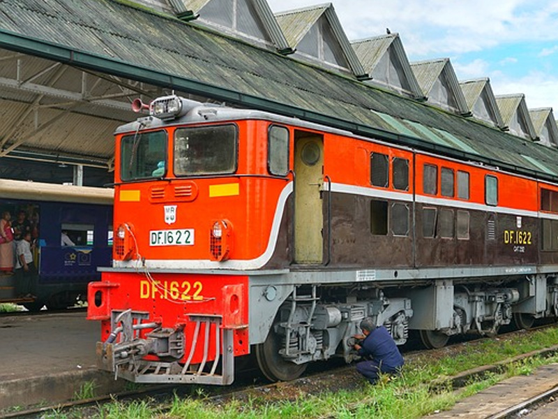 Stationary red train in Yangon