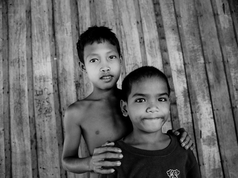 Black and white portrait of two Cambodian kids