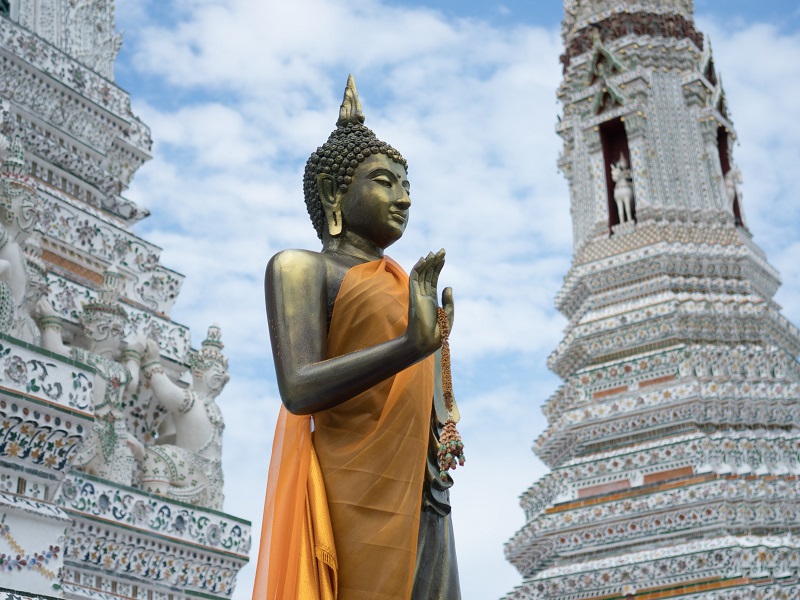 upright Buddhist statue in Bangkok temple