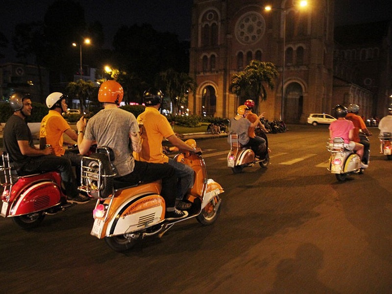 Riding vespa around Saigon at night