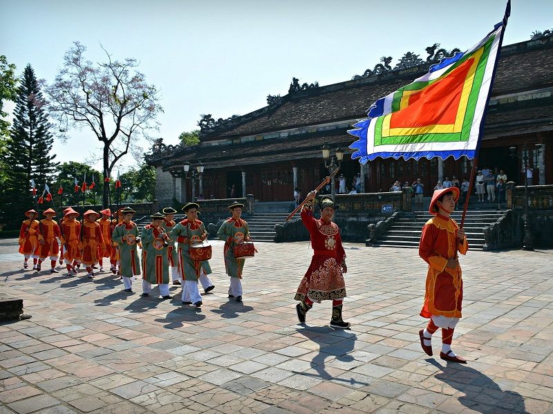 Parade walking through charming Hue