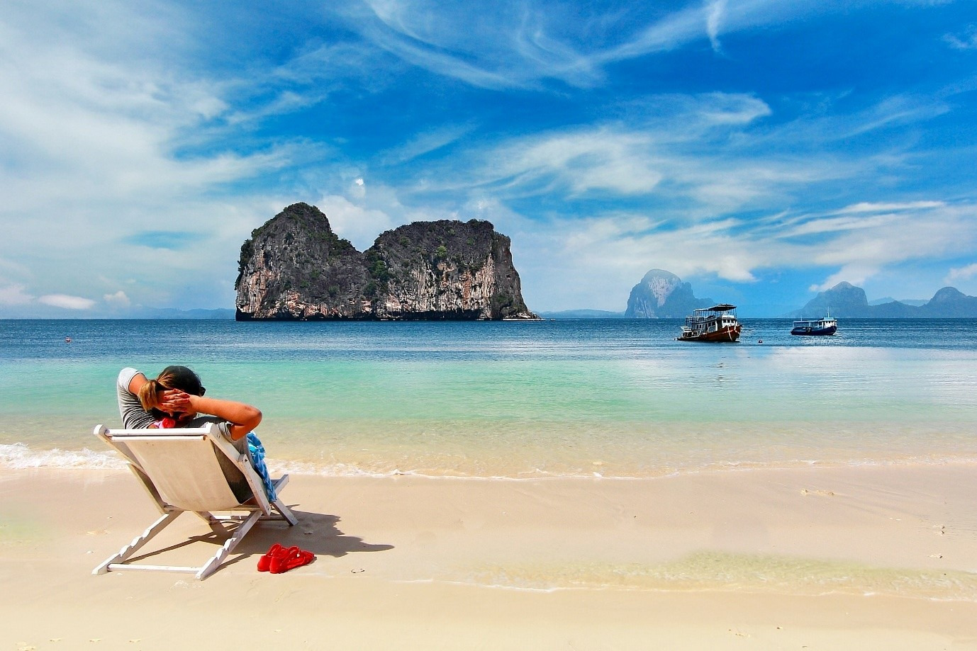 -003-003 Man lounging on a beach in Thailand